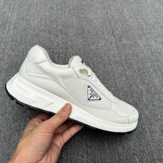 Sneakers Uomo Prada – Eleganza Moderna e Artigianato Italiano
