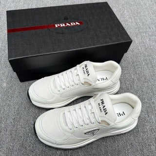 Sneakers Uomo Prada – Eleganza Moderna e Artigianato Italiano